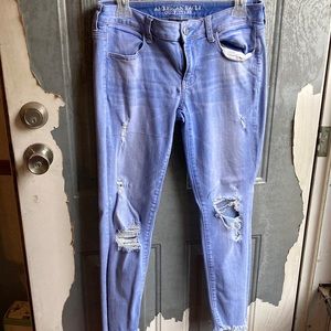 Women Light Blue Ripped Jeans